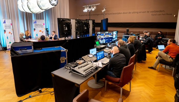 The nerve centre of the Faculty Club restaurant. In the background those who attended the closing panel in person.